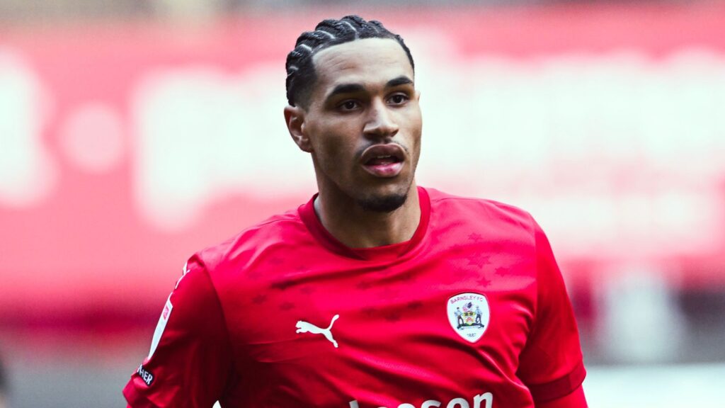 Mansfield Complete Russell Transfer on Two-Year Terms