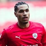 Mansfield Complete Russell Transfer on Two-Year Terms